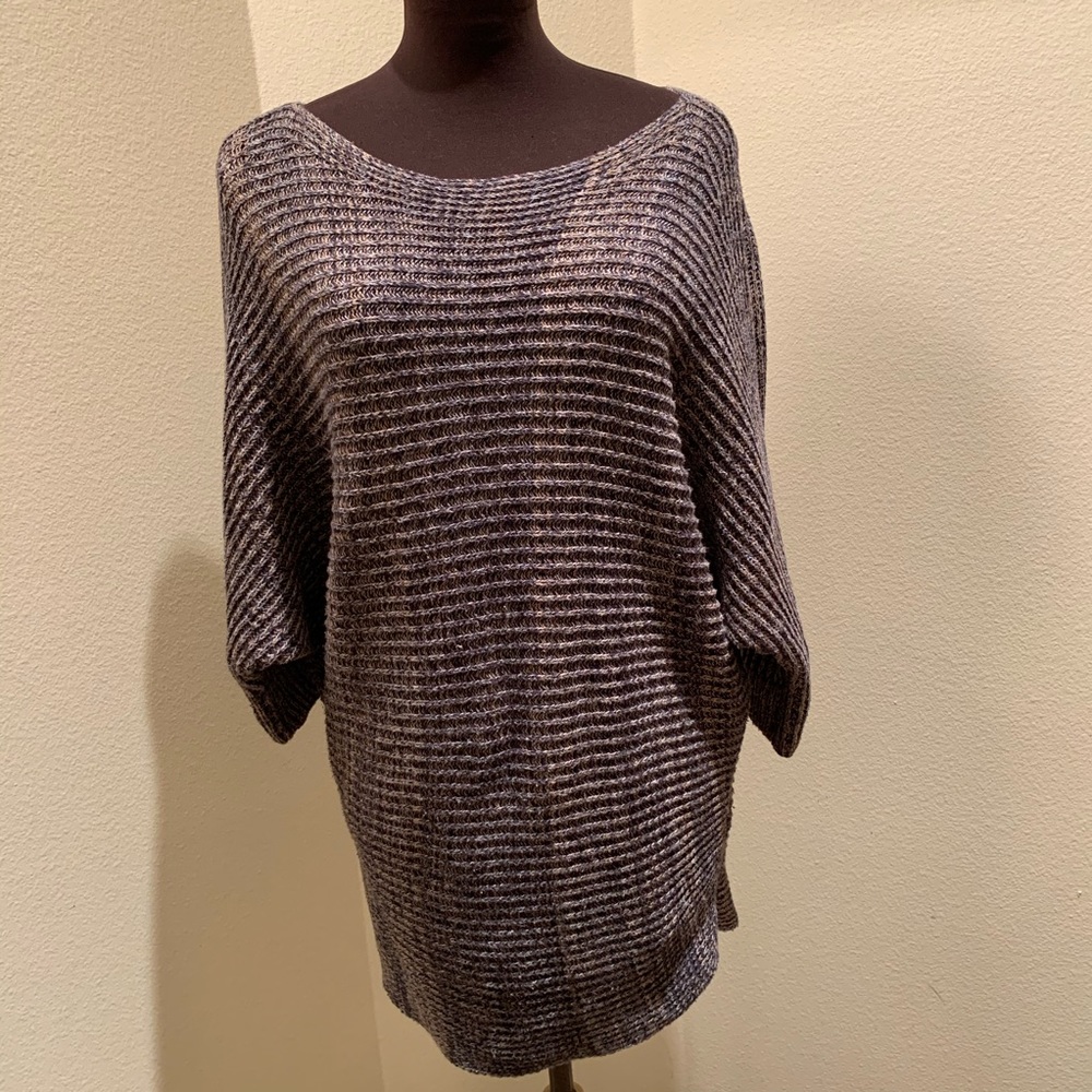 Calvin Klein Jeans in size medium is 3 tone browns
